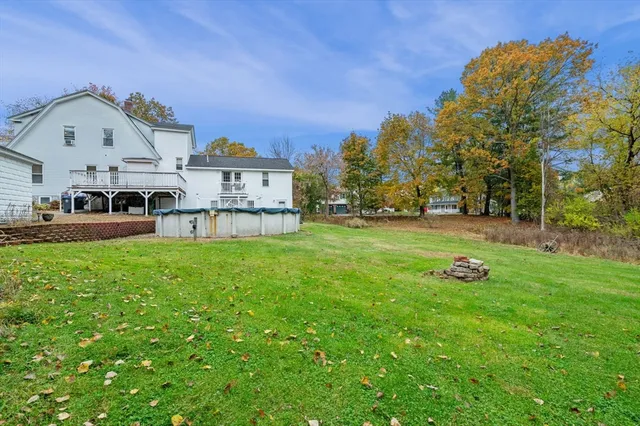 a view of a house with a big yard