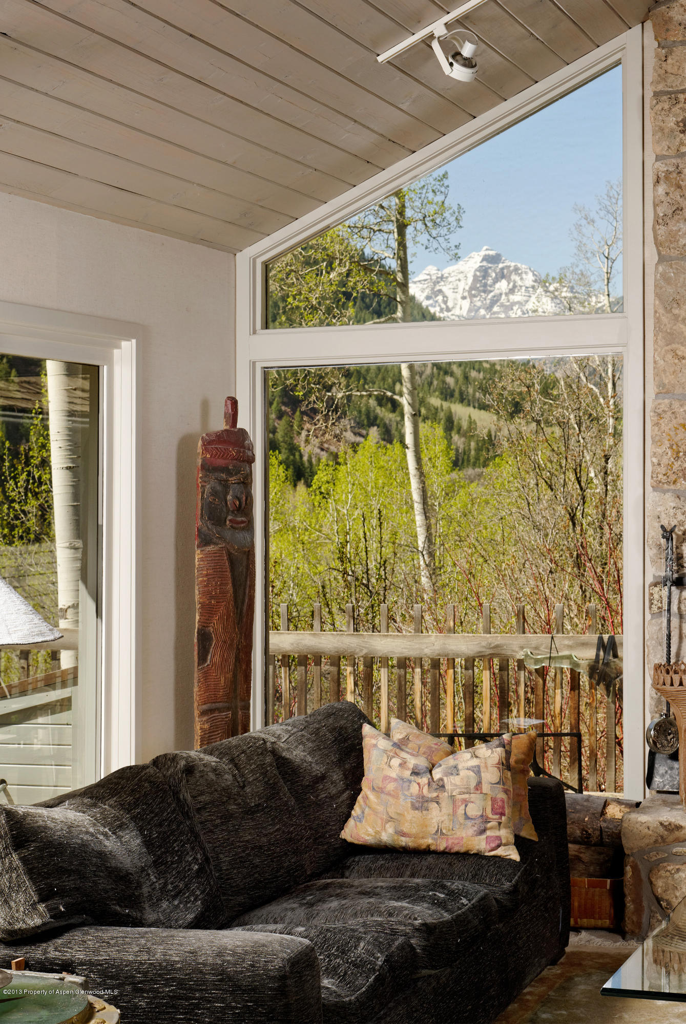 2021 Maroon Creek Road Aspen, CO 81611 - Photo 4 of 21 a living room with furniture and a large window