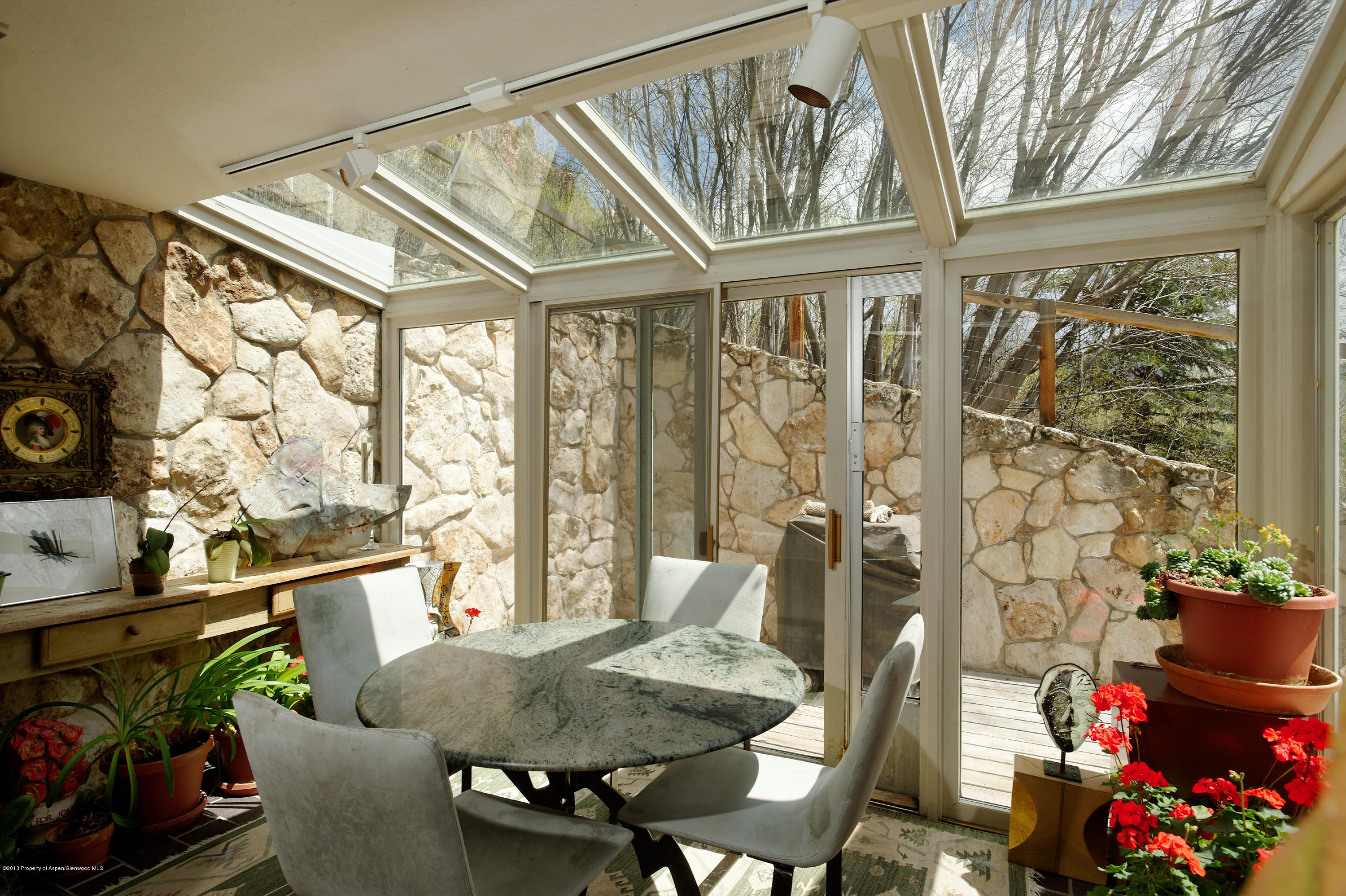 2021 Maroon Creek Road Aspen, CO 81611 - Photo 7 of 21 a view of a dining room with furniture window and outside view