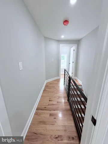 a kitchen with stainless steel appliances kitchen island granite countertop a stove a sink and a microwave