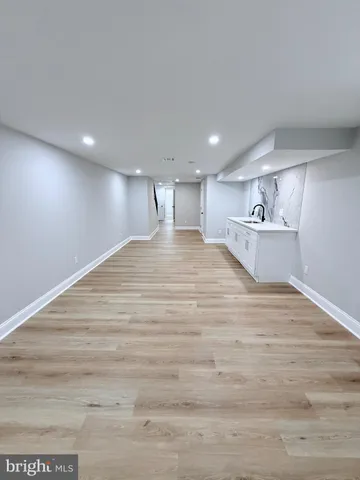 a bathroom with a sink toilet and vanity