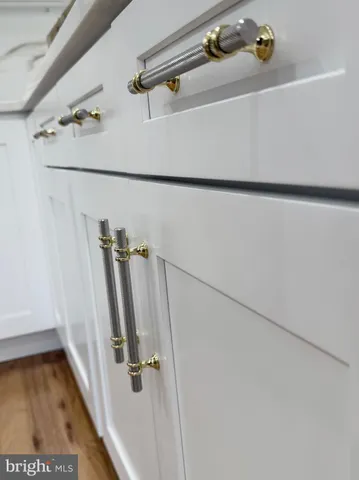 a bathroom with a toilet a sink and shower
