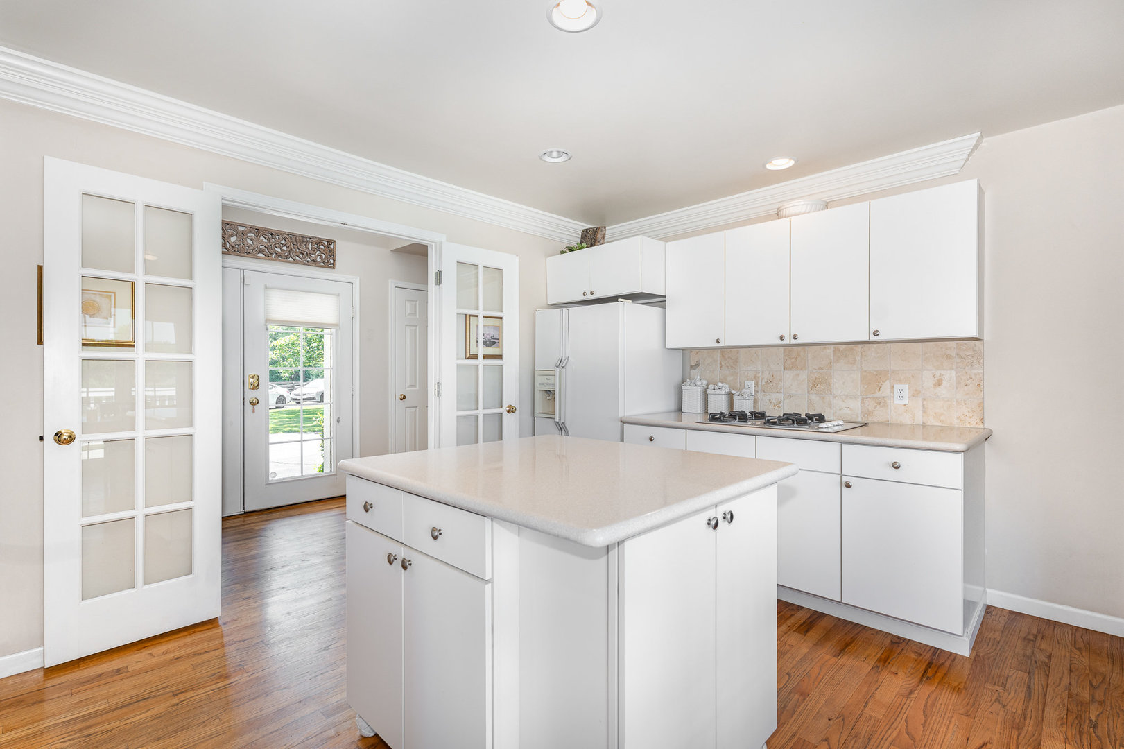 5284 Harvey Road Caledonia, IL 61011 - Photo 11 of 57 a kitchen with a sink cabinets and wooden floor