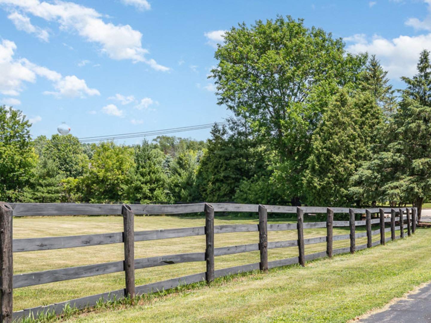 5284 Harvey Road Caledonia, IL 61011 - Photo 7 of 57 a view of a yard with wooden fence