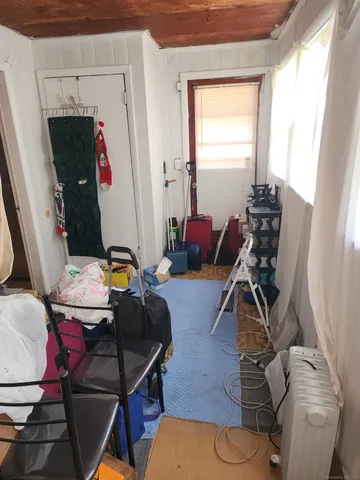 a kitchen with stainless steel appliances a stove a refrigerator and cabinets