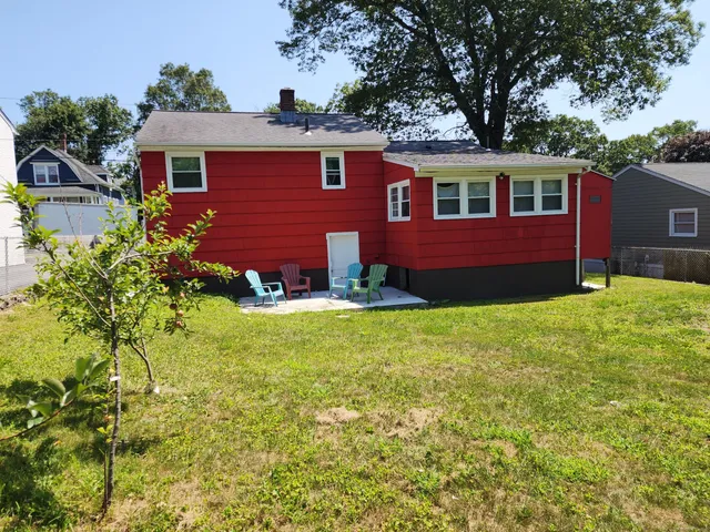 front view of a house with a yard