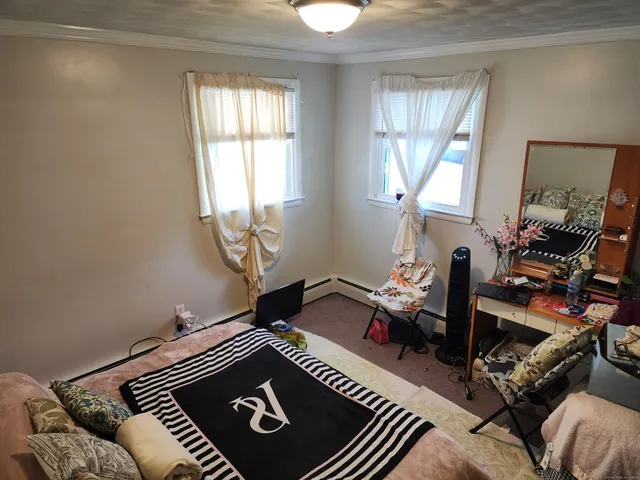 a room with furniture or couch and a window