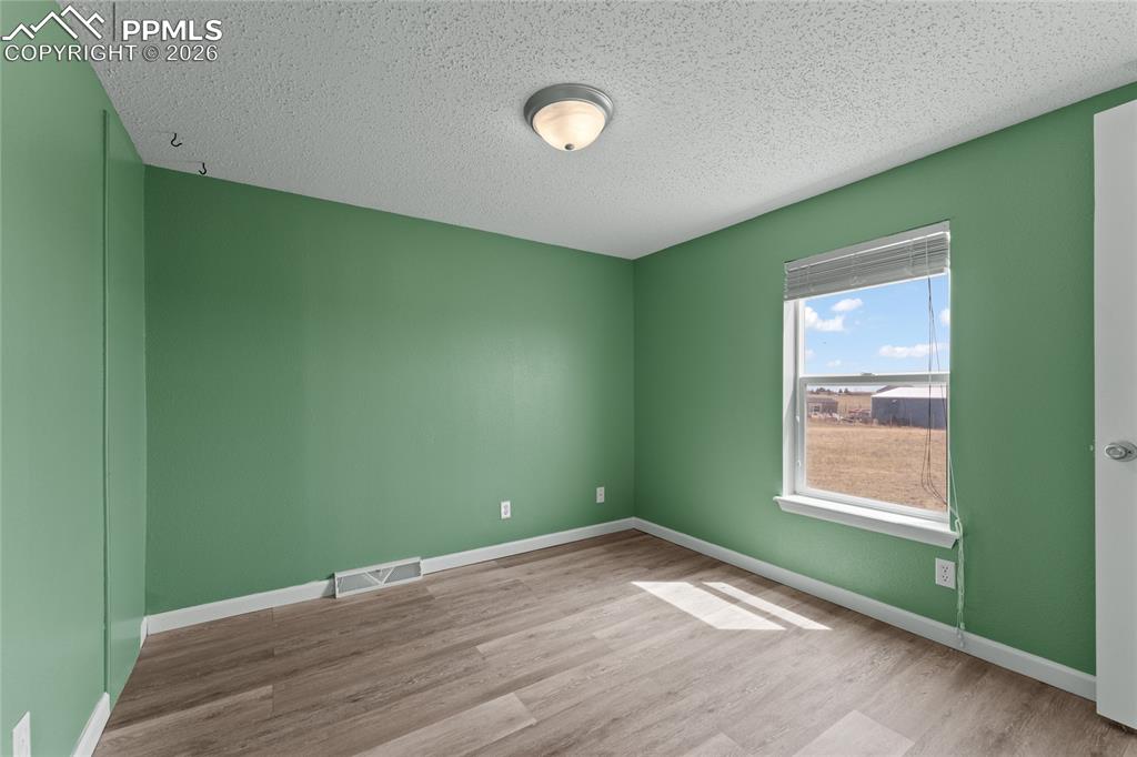 5505 Whipshaw Road Peyton, CO 80831 - Photo 28 of 39 a view of empty room with window
