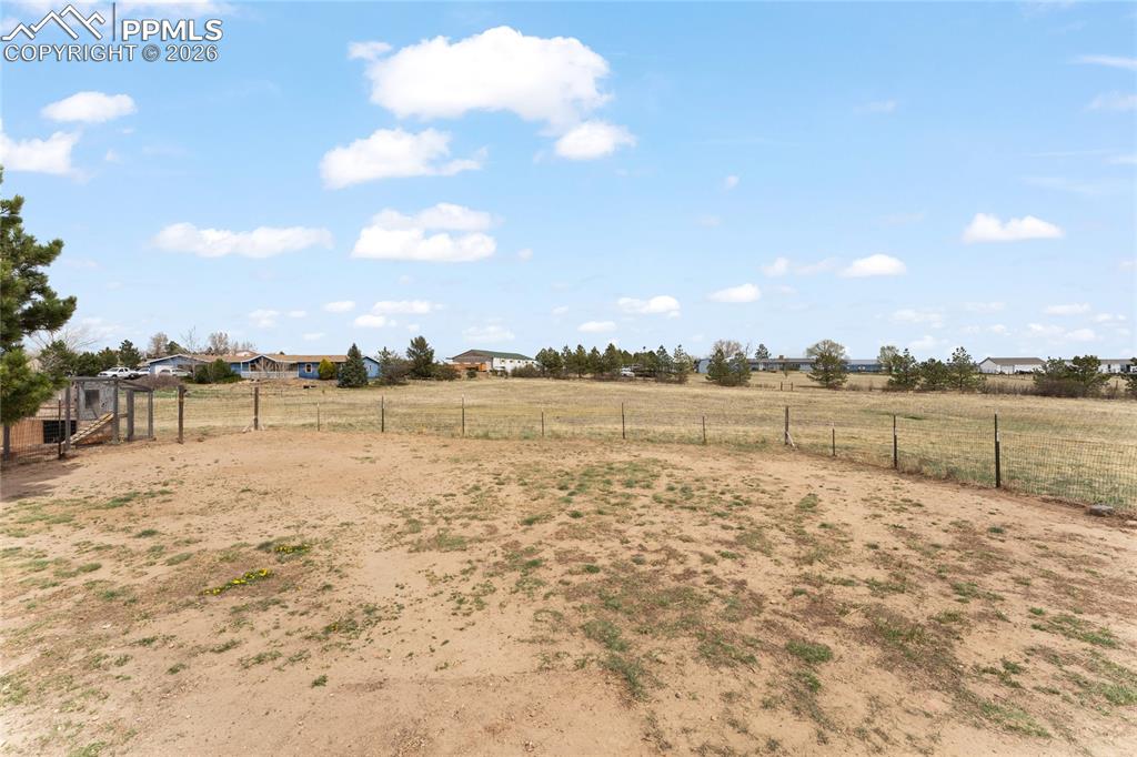 5505 Whipshaw Road Peyton, CO 80831 - Photo 34 of 39 a view of lake with city view
