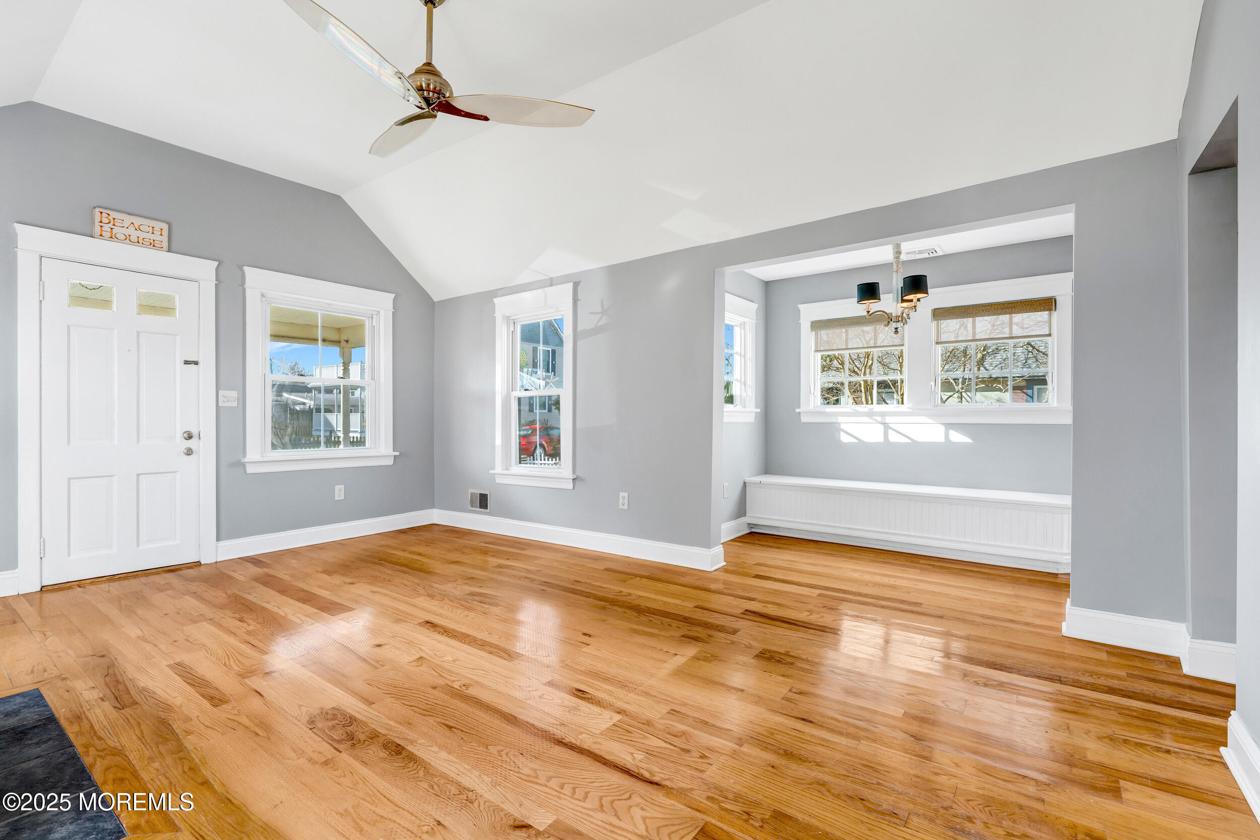 81 Inskip Avenue Ocean Grove, NJ 07756 - Photo 13 of 86 a view of an empty room with wooden floor and a window