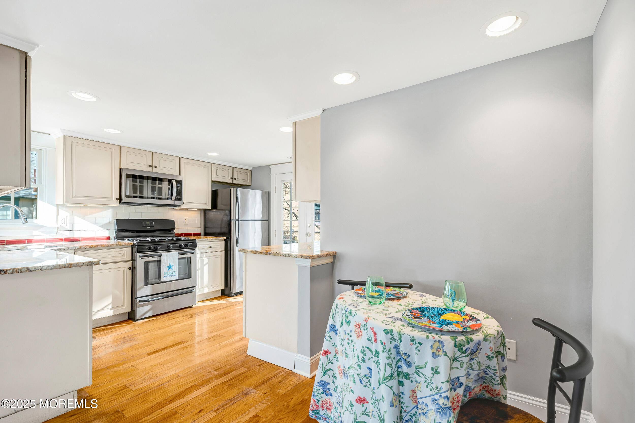 81 Inskip Avenue Ocean Grove, NJ 07756 - Photo 18 of 86 a bedroom with furniture and a wooden floor