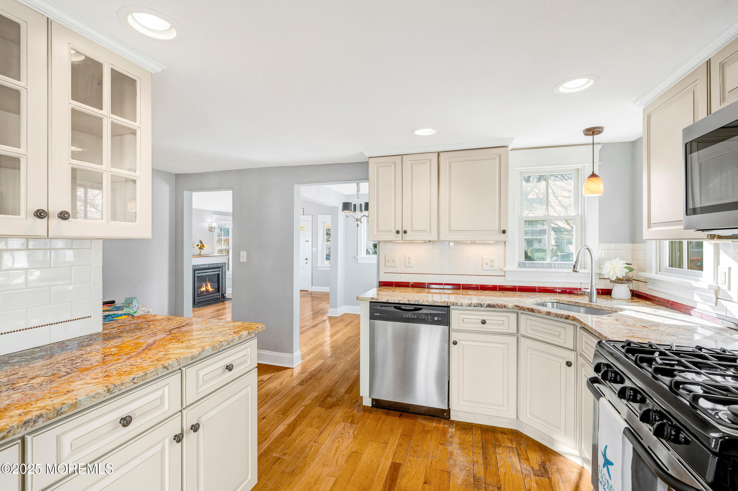 81 Inskip Avenue Ocean Grove, NJ 07756 - Photo 23 of 86 a kitchen with stainless steel appliances granite countertop a sink stove and refrigerator