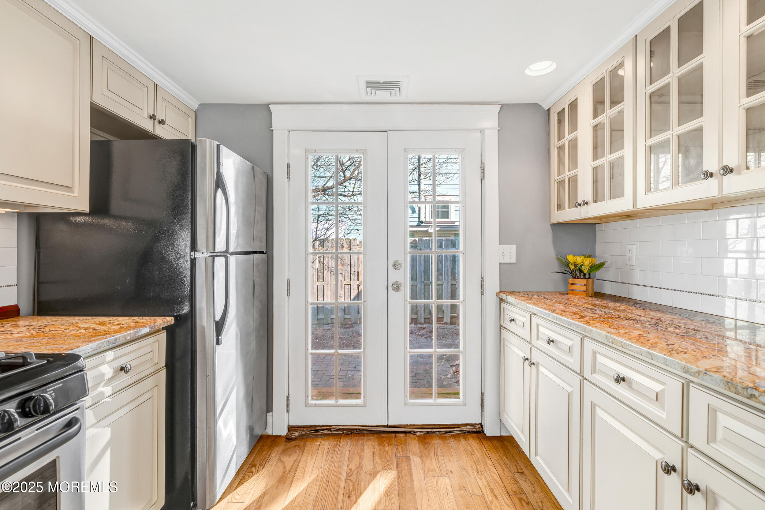 81 Inskip Avenue Ocean Grove, NJ 07756 - Photo 25 of 86 a kitchen with stainless steel appliances granite countertop a refrigerator and a stove