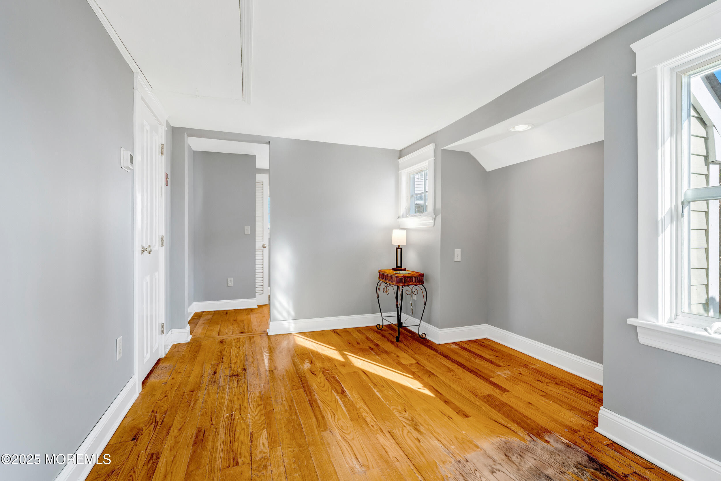 81 Inskip Avenue Ocean Grove, NJ 07756 - Photo 31 of 86 a bedroom with a bed and a window