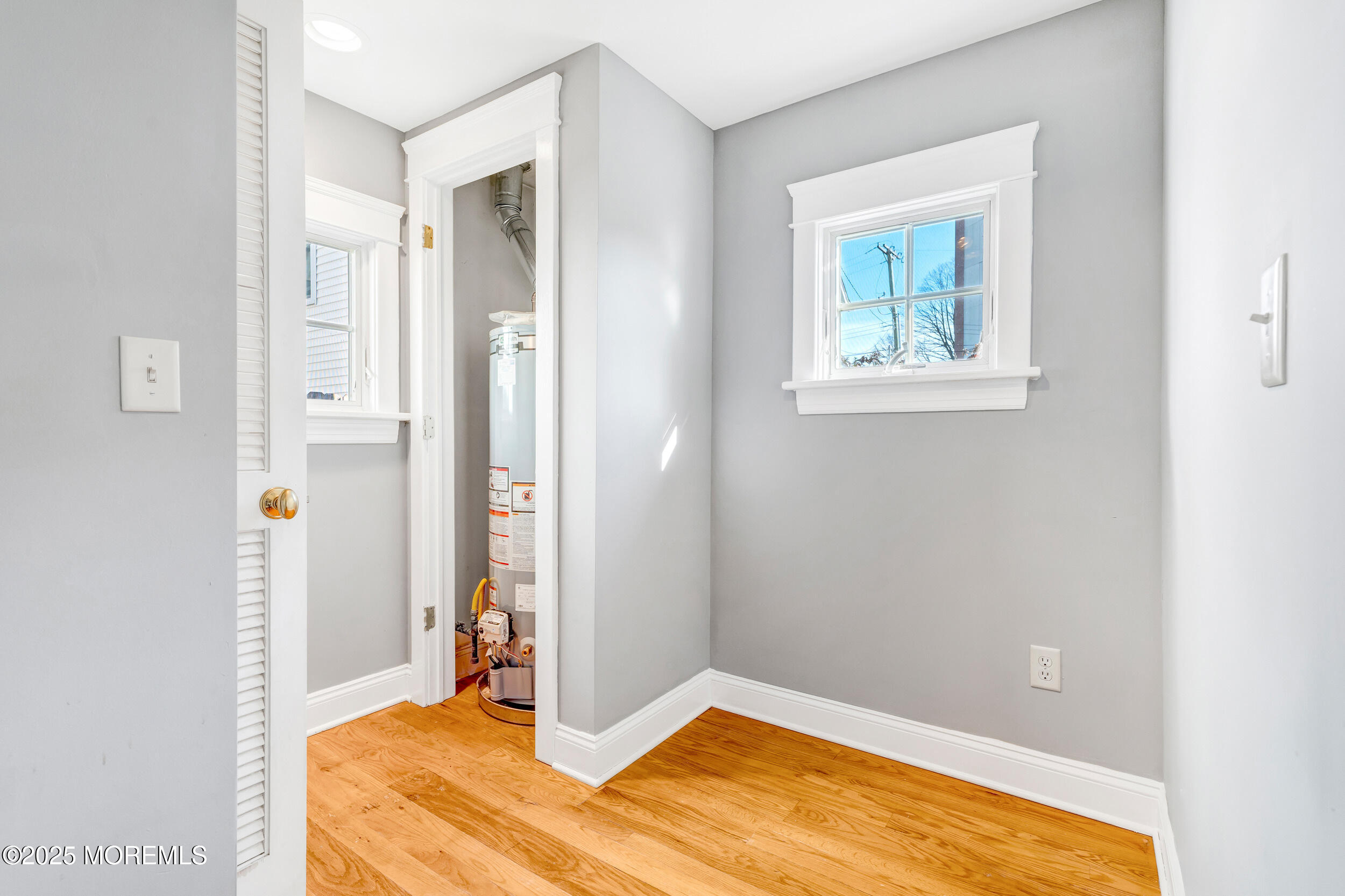 81 Inskip Avenue Ocean Grove, NJ 07756 - Photo 37 of 86 a bedroom with a bed and a window