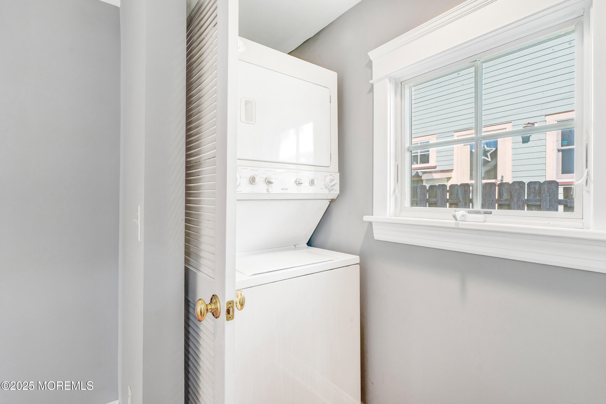 81 Inskip Avenue Ocean Grove, NJ 07756 - Photo 38 of 86 a utility room with dryer and washer