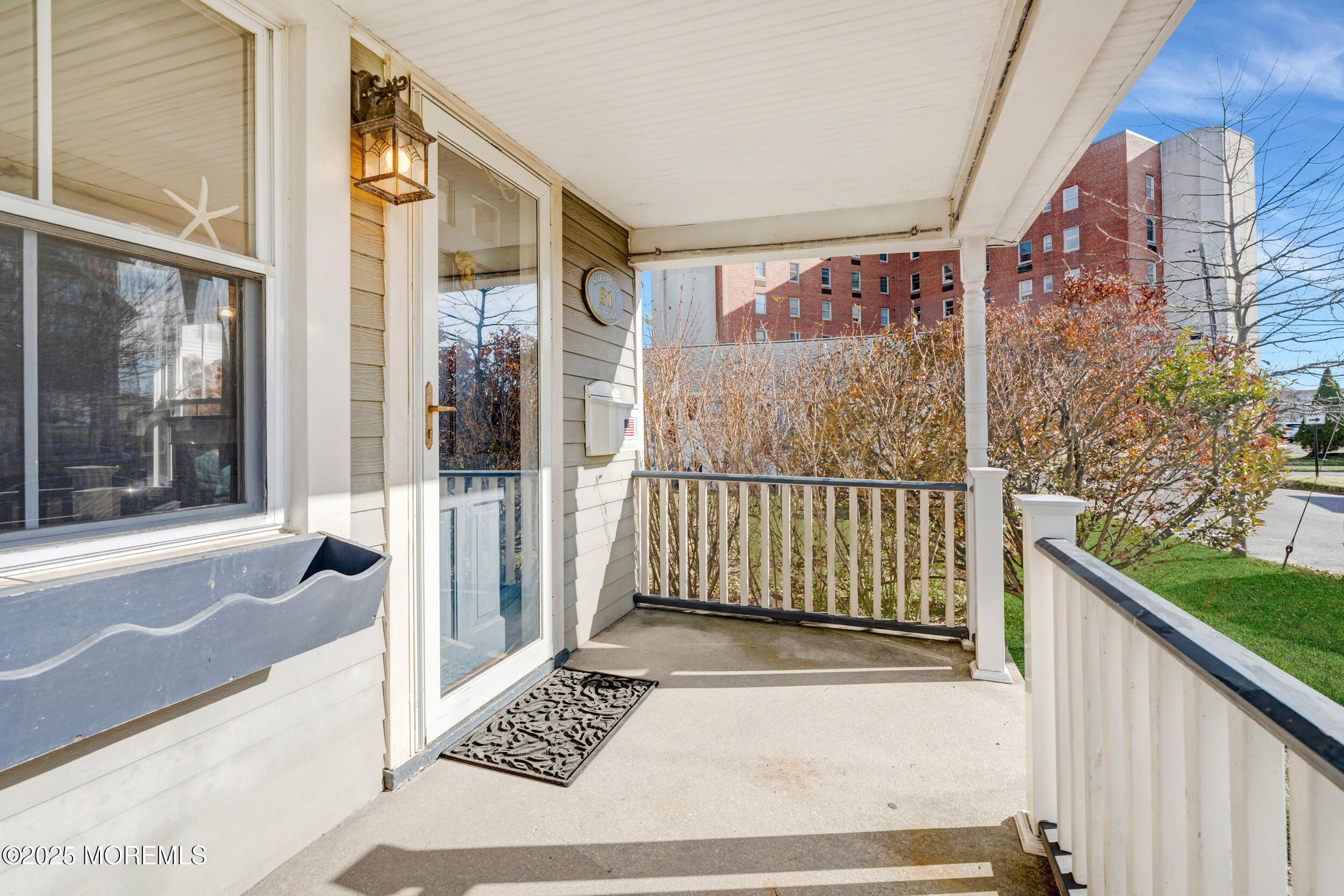 81 Inskip Avenue Ocean Grove, NJ 07756 - Photo 7 of 86 a view of a balcony with wooden floor