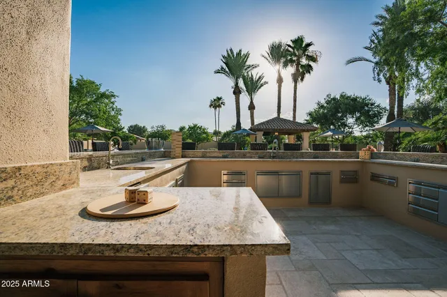 a view of a swimming pool with a patio