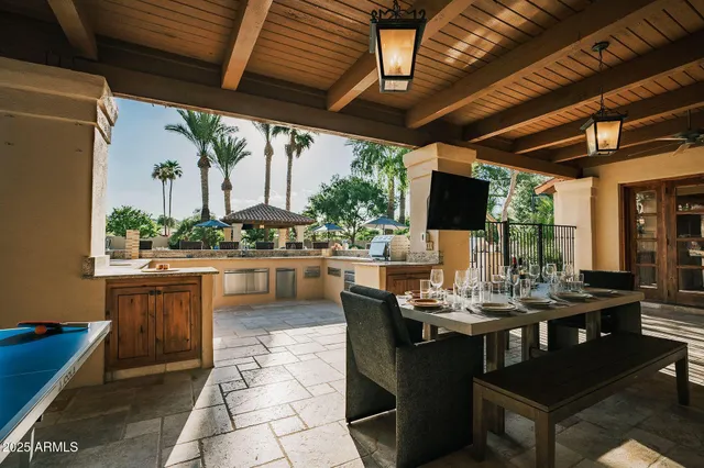 a outdoor dining space with furniture