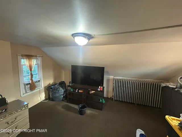 a view of a livingroom with furniture