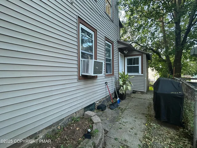 a view of a house with a patio