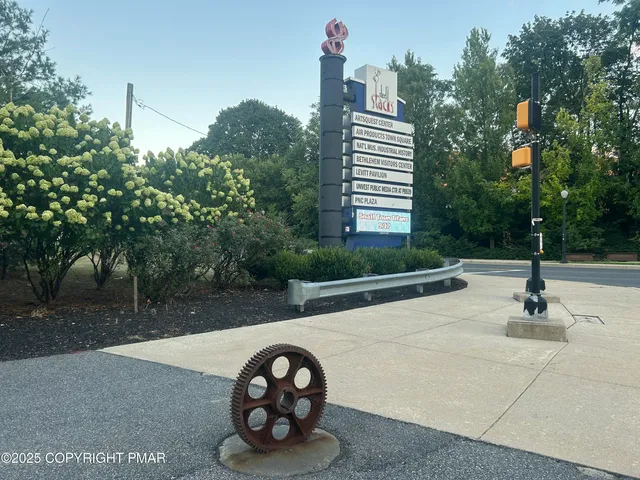 a view of a swimming pool with a yard