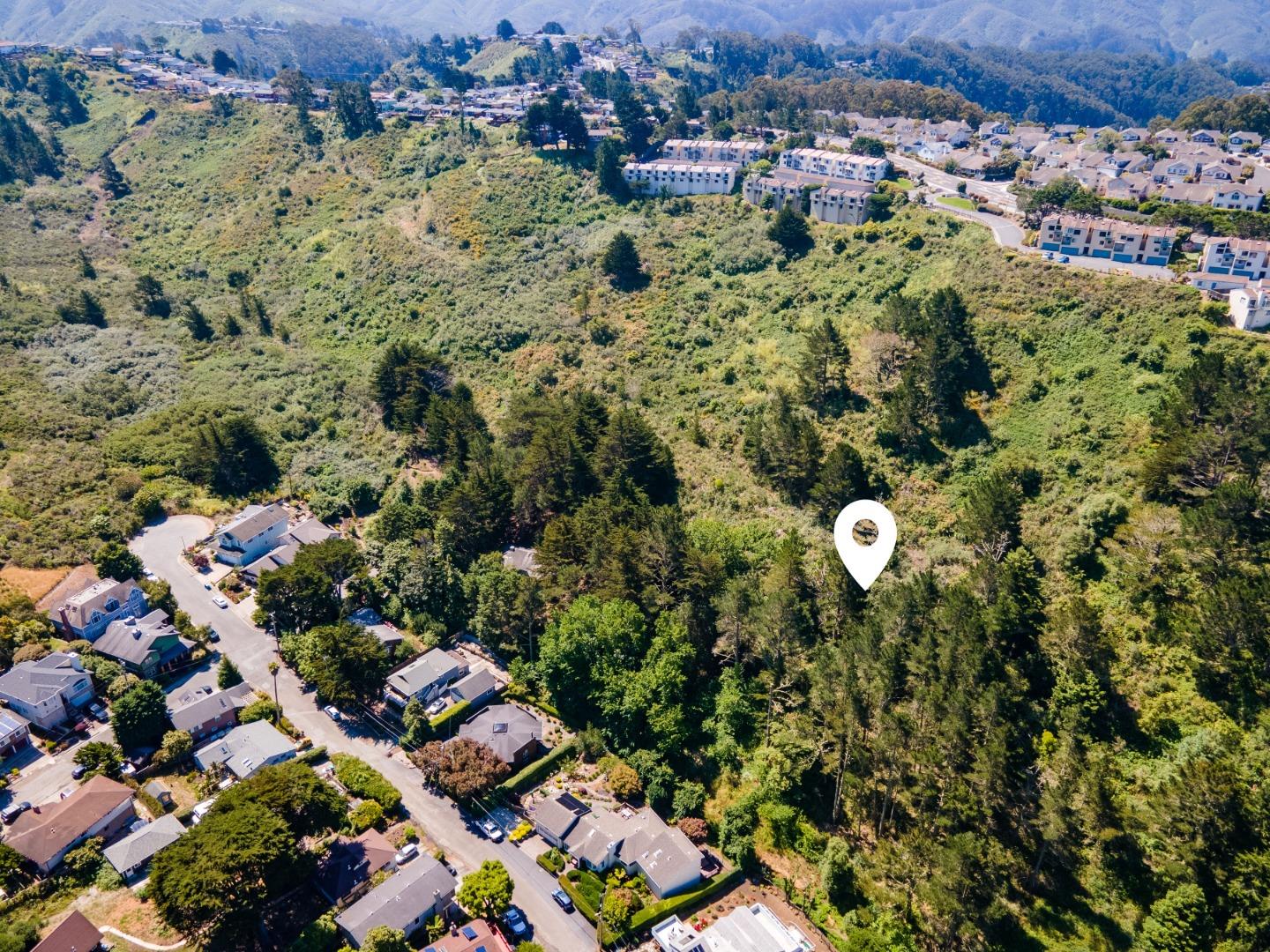 0 Oddstad Boulevard Pacifica, CA 94044 - Photo 3 of 4 an aerial view of a house with a yard
