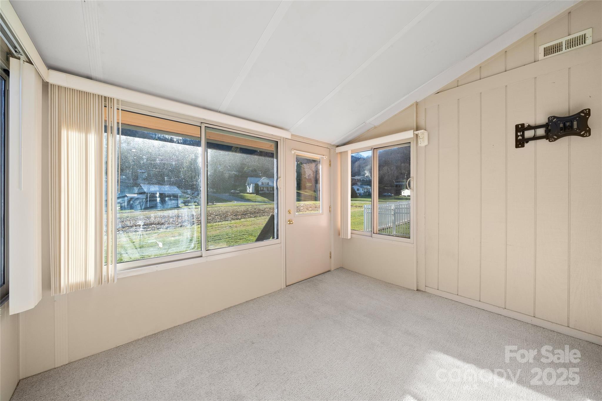 94 Market Street Maggie Valley, NC 28751 - Photo 23 of 40 a view of an empty room with a window