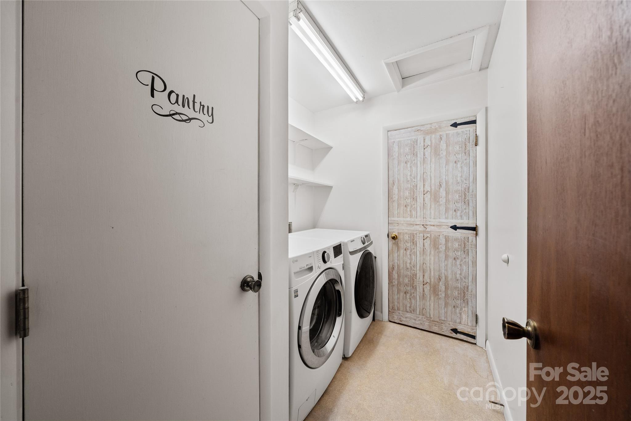 94 Market Street Maggie Valley, NC 28751 - Photo 30 of 40 a utility room with dryer and washer