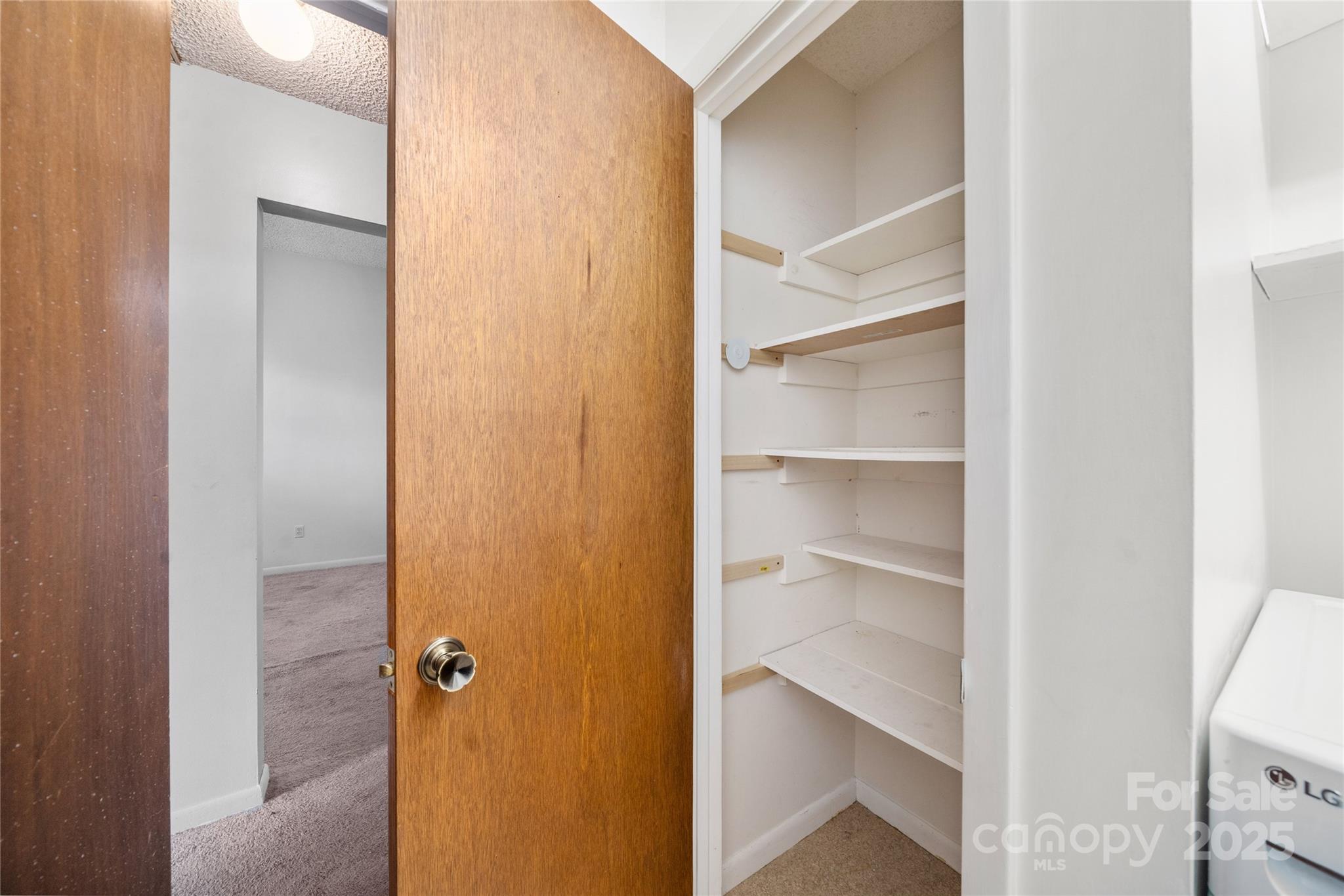 94 Market Street Maggie Valley, NC 28751 - Photo 32 of 40 a view of a room with rack on the wall