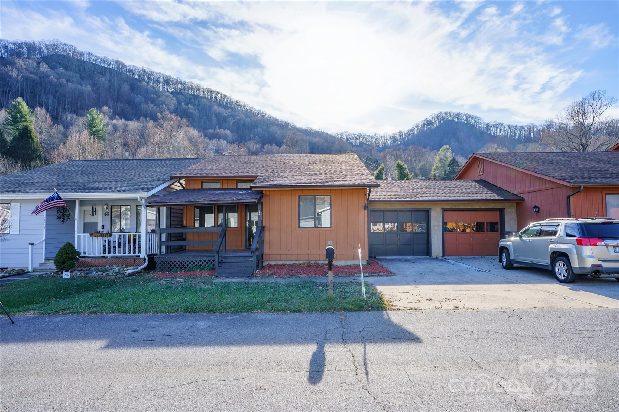 94 Market Street Maggie Valley, NC 28751 - Photo 37 of 40 front view of a house with a yard