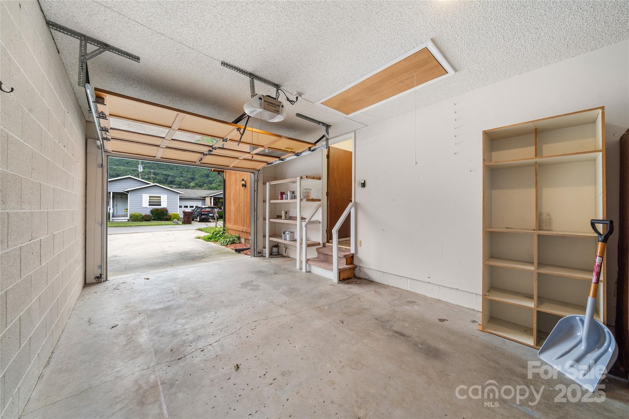 94 Market Street Maggie Valley, NC 28751 - Photo 4 of 40 a view of empty room with wooden floor
