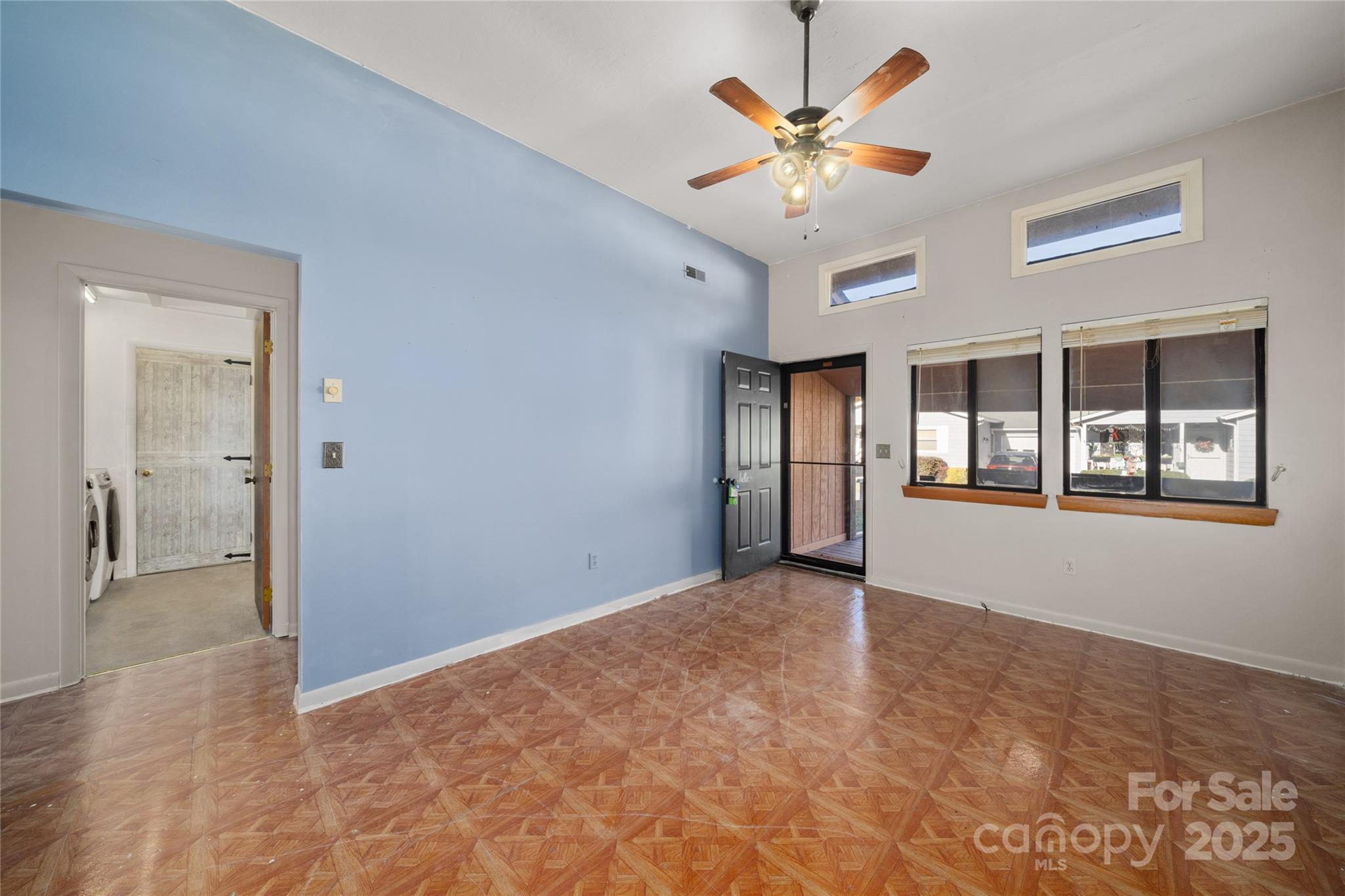 94 Market Street Maggie Valley, NC 28751 - Photo 7 of 40 a view of an empty room with a window