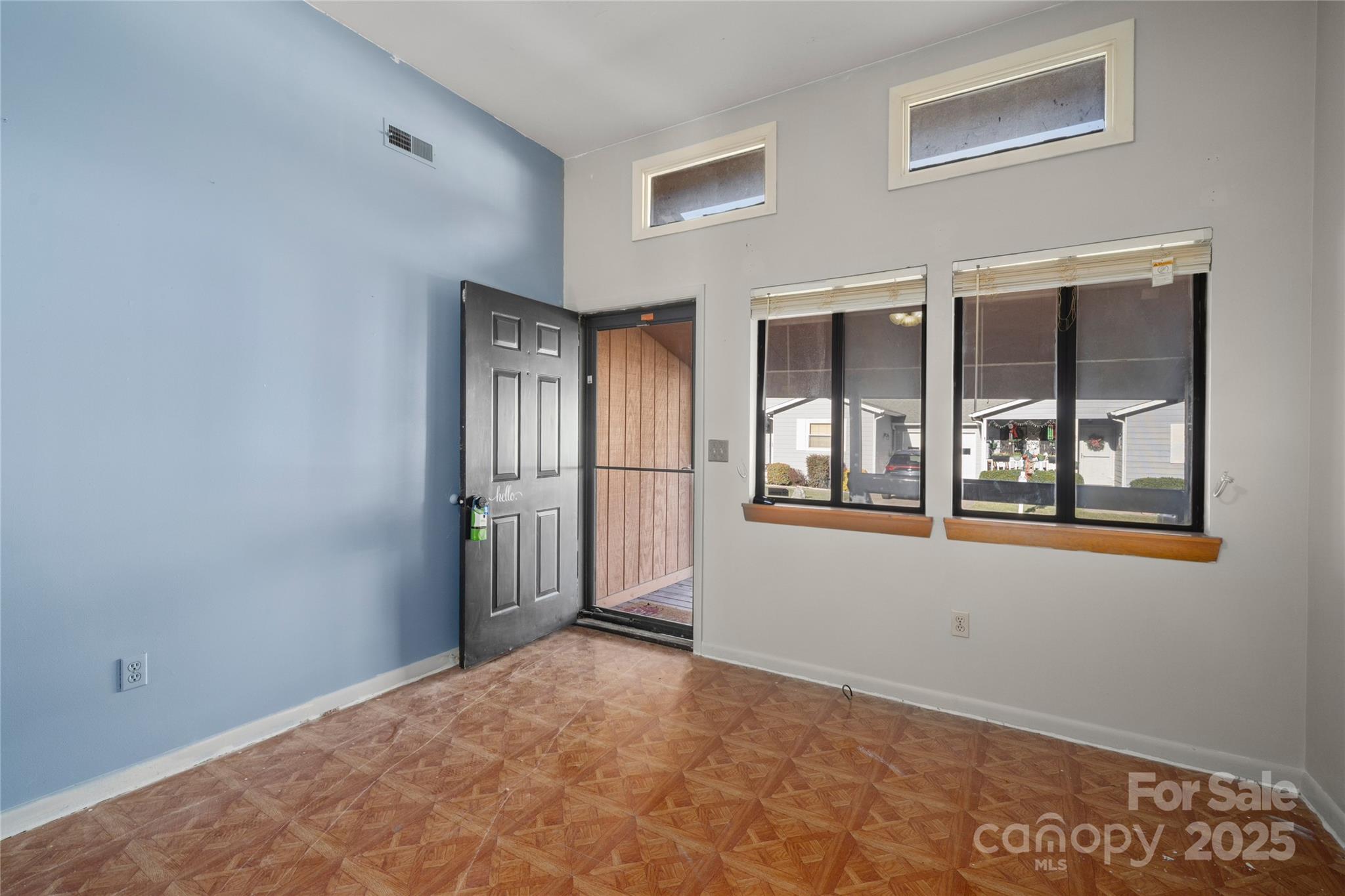 94 Market Street Maggie Valley, NC 28751 - Photo 8 of 40 a view of an empty room with a window