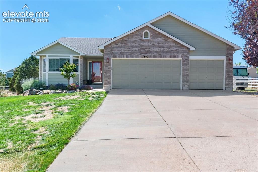 7840 Midnight Road Peyton, CO 80831 - Photo 2 of 48 Enjoy true main-level living w/3-car garage