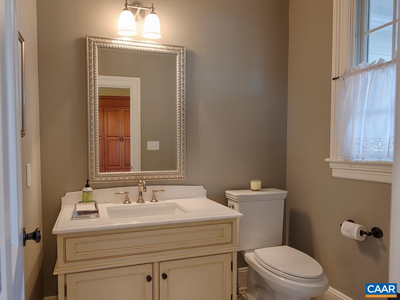 1712 A Novum Church Road Reva, VA 22735 - Photo 10 of 37 a bathroom with a sink toilet and mirror
