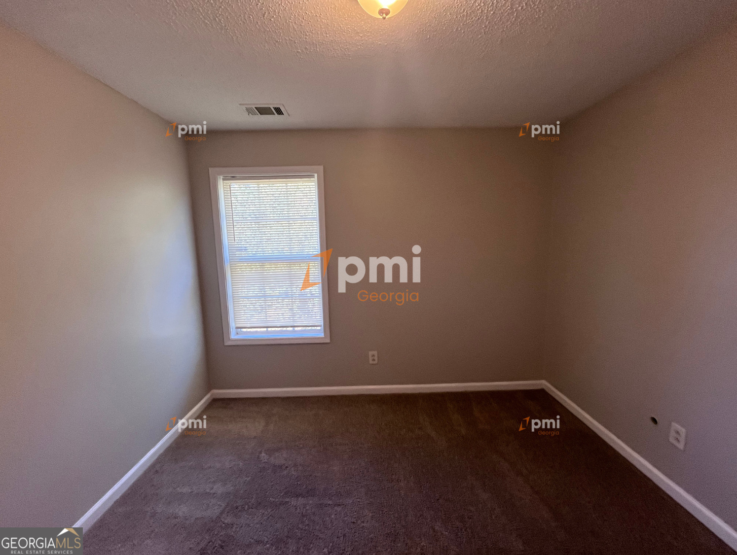 2015 Ivy Lane Union City, GA 30291 - Photo 11 of 18 an empty room with a window