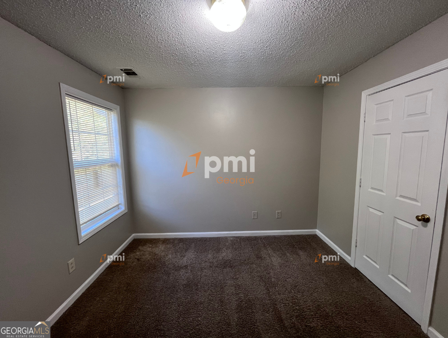 2015 Ivy Lane Union City, GA 30291 - Photo 12 of 18 an empty room with windows