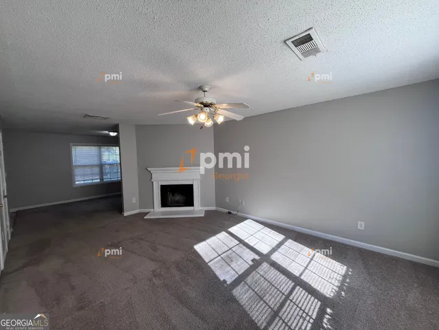 a view of a livingroom with a fireplace