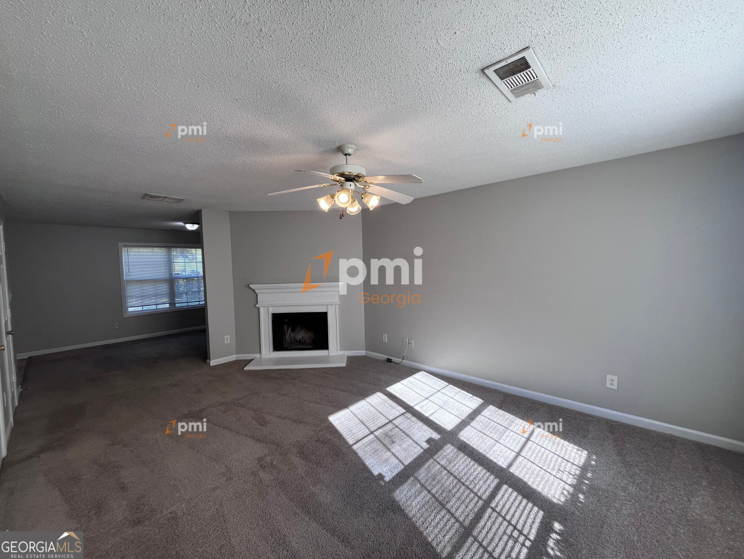 2015 Ivy Lane Union City, GA 30291 - Photo 5 of 18 a view of a livingroom with a fireplace