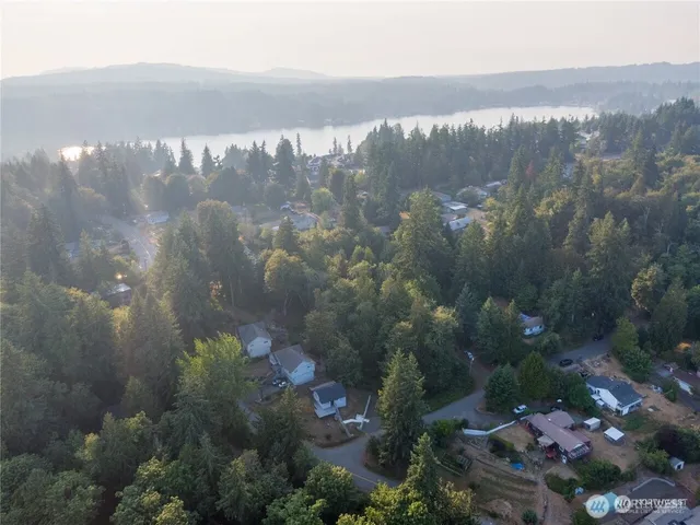 a view of a lake in middle of a house
