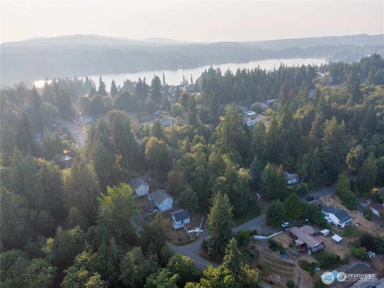 14-xx Price Road Northwest Bremerton, WA 98312 - Photo 1 of 4 a view of a lake in middle of a house