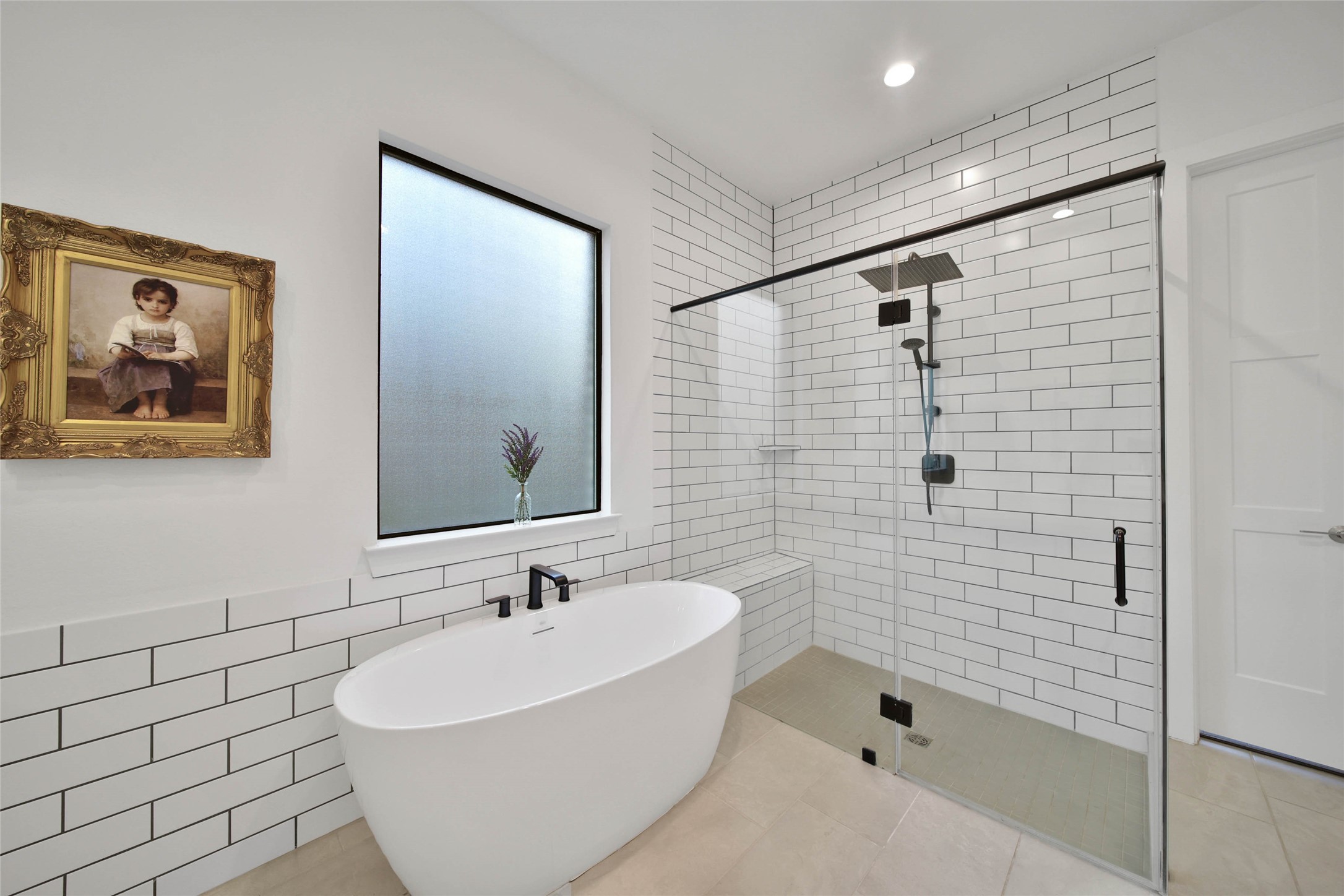 1015 Oak Briar Lane Conroe, TX 77384 - Photo 29 of 50 a bathroom with a bathtub and shower