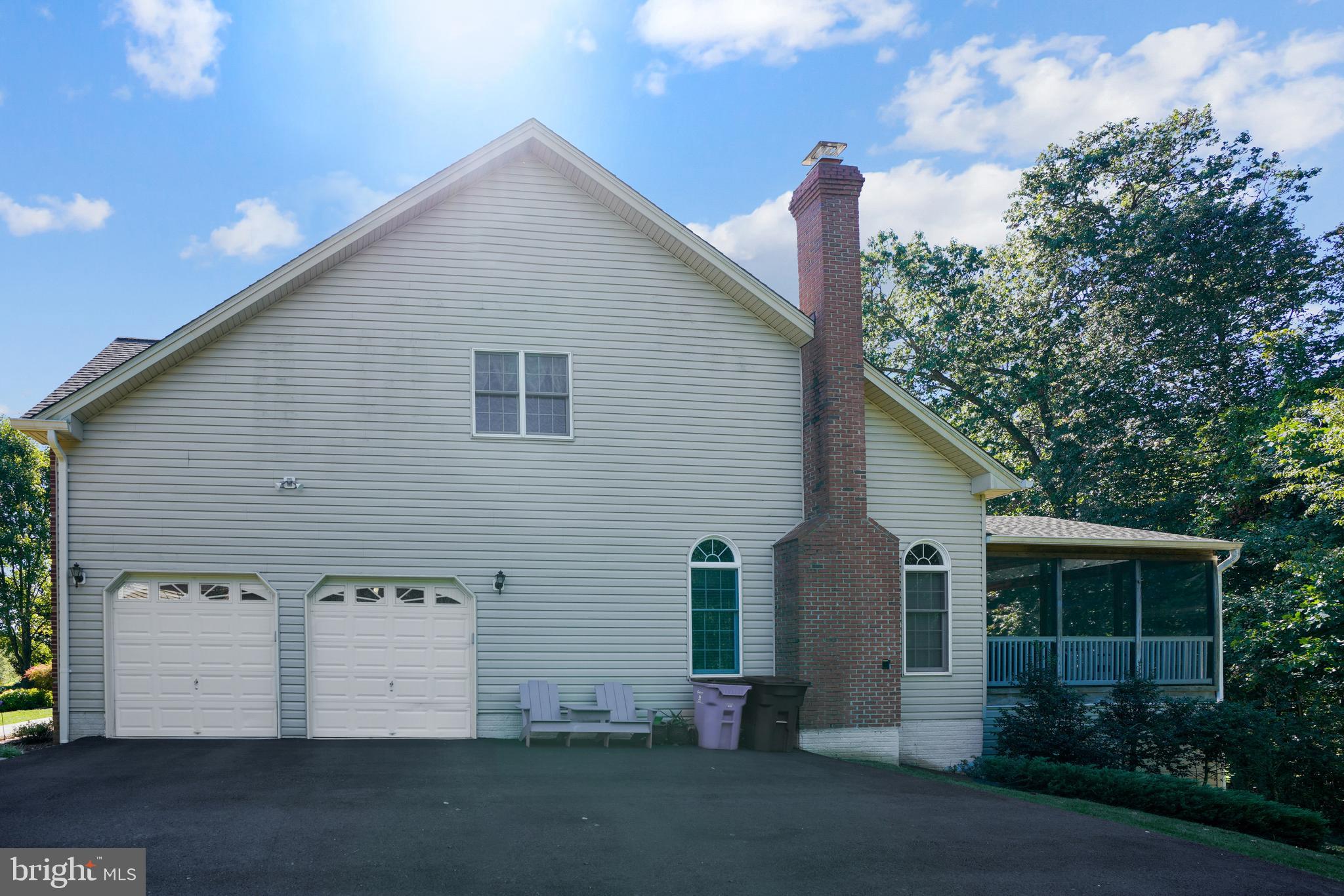 15181 Sapling Ridge Drive Dayton, MD 21036 - Photo 4 of 5 Double car garage and extended driveway