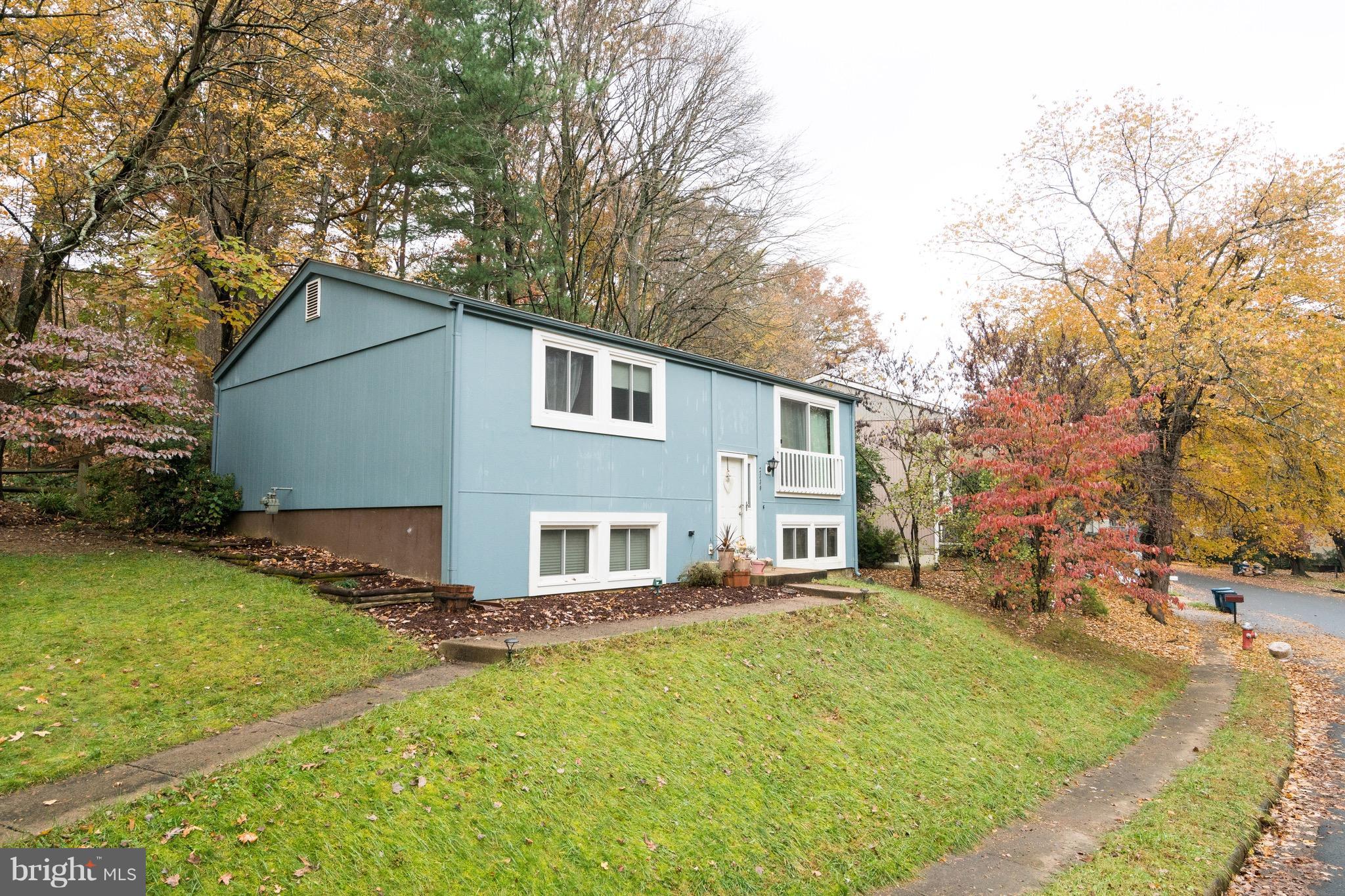 2330 Old Trail Drive Reston, VA 20191 - Photo 2 of 28 a view of a house with a yard