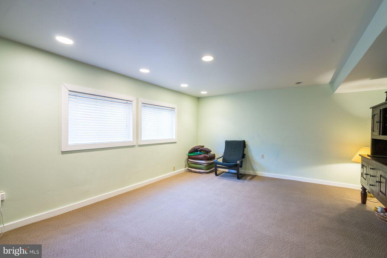 2330 Old Trail Drive Reston, VA 20191 - Photo 23 of 28 a living room with a window