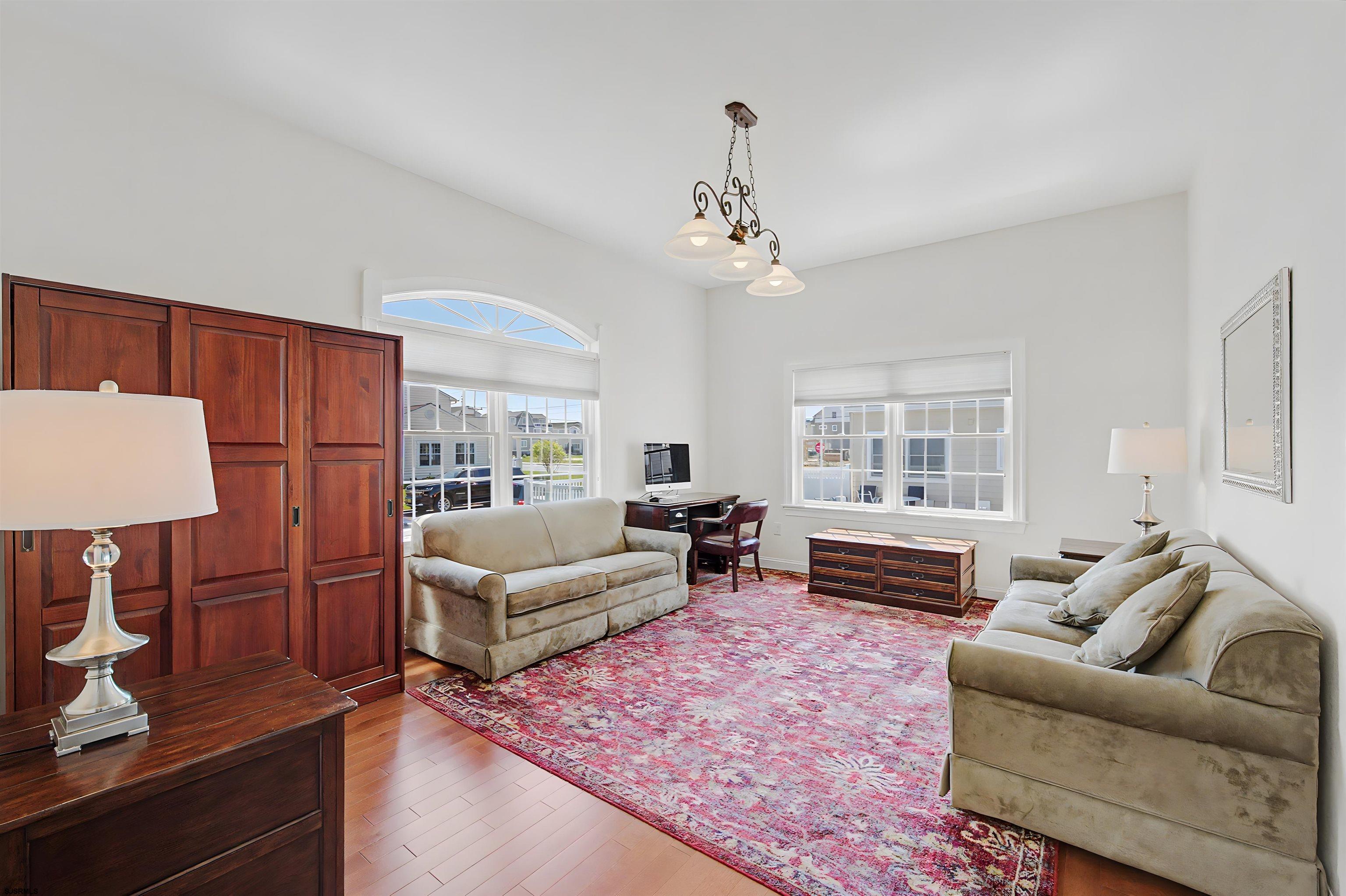 212 17th Street South Brigantine, NJ 08203 - Photo 19 of 37 a living room with furniture and a wooden floor