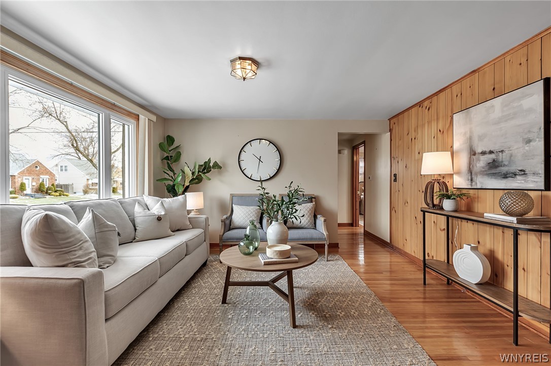 21 Addison Avenue Amherst, NY 14226 - Photo 6 of 43 LIVING ROOM WITH ACCENT WOOD WALL