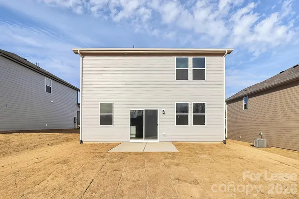 a house with yard in front of it
