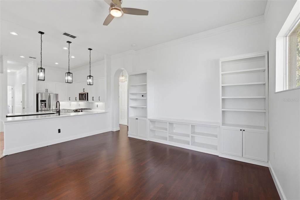 2822 Falcon Ridge Clermont, FL 34711 - Photo 21 of 59 a view of a kitchen with lot of cabinets and wooden floor